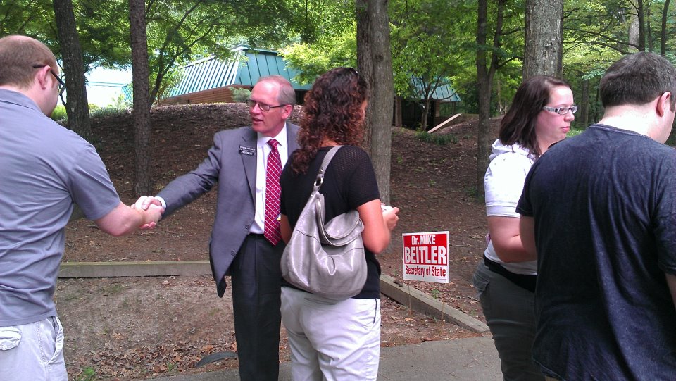 Dan Nagle Talks to Voters at Early Voting
